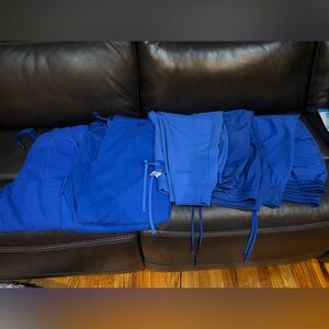 Lot of royal blue scrub pants